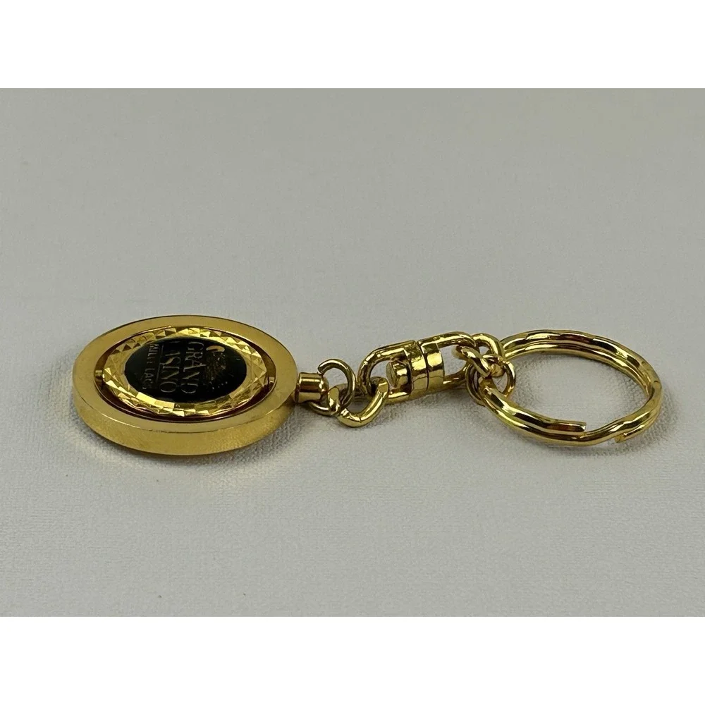 Vintage Grand Casino Mille Lacs Gold Tone Spinner Keychain Fob Souvenir